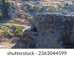 Small photo of Ancient and carved rock formations in the mountains.Ancient and carved rock formations in the mountains.Ancient and carved rock formations in the mountains.Ancient and carved rock formations in the mo