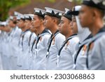 Small photo of Kuala Lumpur, Malaysia - May 15, 2023 : Royal Malaysia Navy officers marching during the 89th Malaysian Royal Navy celebration.