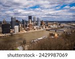 Small photo of Pittsburgh, PA USA - 4 10 2022: From Mount Washington, the Monongahela River frames the downtown Pittsburgh, PA skyline on a beautiful spring day.