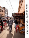 Small photo of Pittsburgh, PA USA - 4 2 2022: In Pittsburgh, PA, the bustling Strip District comes alive on a vibrant spring day, with locals and visitors alike immersed in the energetic atmosphere of this dynamic