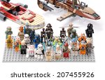 Small photo of Ankara, Turkey - July 07, 2012: Lego Star Wars minifigures in front of Luke's Landspeeder