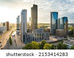 Small photo of Beautiful aerial evening view of Vilnius business district with scenic sunset illumination. City life in Vilnius, Lithuania.