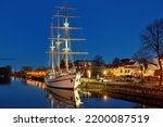 Small photo of Meridianas sailing ship, one of the most recognisable landmarks of Klaipeda, a docked boat featuring genteel riverside restaurant. Nightlife of Klaipeda, Lithuania.