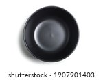 Black clay cup isolated on white background. View from above