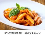Small photo of pene pasta in tomato souce