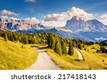 Great view on the Sassolungo (Langkofel) and Sella group, valley Gardena. National Park Dolomites, South Tyrol. Location Ortisei, S. Cristina and Selva, Italy, Europe. Dramatic scene. Beauty world.