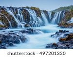 Dramatic views of the bright powerful Bruarfoss waterfall. Popular tourist attraction. Unusual and picturesque scene. Location place South Iceland, Europe. Artistic picture. Beauty world.