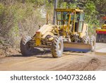 Small photo of CHIANG RAI, THAILAND - FEBRUARY 01, 2018: Outdoor view of heavy machinery for rail road construction in Chiang Mai, Thailand, working on a road construction site to smooth the ground