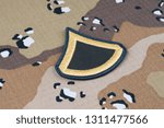 Small photo of May 12, 2018. US ARMY Private First Class rank patch on Desert Battle Dress Uniform