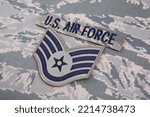 Small photo of August 31, 2020. US AIR FORCE branch tape and Staff Sergeant rank patch on digital tiger-stripe pattern Airman Battle Uniform (ABU)