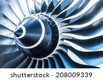 blue tone jet engine blades closeup