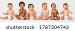 Row Of Six Multi Ethnic Babies...