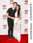 Small photo of LAS VEGAS-SEP 19: Camila Cabello (R) and Shawn Mendes attend the 2015 iHeartRadio Music Festival at MGM Grand Garden Arena Night 2 on September 19, 2015 in Las Vegas, Nevada.