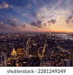 Small photo of Experience the awe-inspiring beauty of NYC skyline at sunset from Empire State Building. A moment you'll never forget.