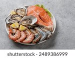 Seafood Platter Delight: Shrimps, Salmon, Oysters Galore. With copy space