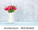 Red Tulips Bouquet In Front Of...