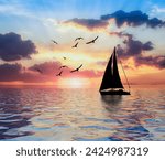 Sailboat at sea with the sunset