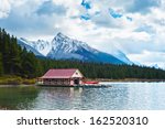 White Rock Mountains with trees in Jasper National Park, Alberta ...