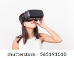 Asian Woman Watching With Vr...