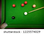 black ball shot in snooker game. top view