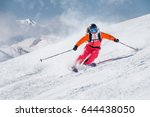Female Skier On A Slope In The...