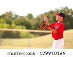 Young Baseball Player In Red...