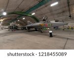 Small photo of GOTEBORG, SWEDEN - JUL 10, 2011: Saab Dragen fighter jet inside the Aeroseum. The museum is a unique destination inside a declassified Swedish Air Force bunker carved out of solid rock.