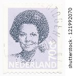 Small photo of NETHERLANDS - CIRCA 1982: A stamp printed in Netherlands shows portrait of Queen Beatrix regnant of the Kingdom of the Netherlands, circa 1982