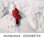 Red Fire Hydrant Almost Buried...