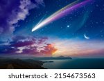 Amazing unreal background: giant colorful comet and rising crescent moon in starry sky over calm sea. Elements of this image furnished by NASA.