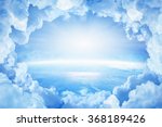 Light from heaven, blue planet Earth in white clouds, bright sunlight from above. Elements of this image furnished by NASA nasa.gov