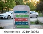 Small photo of AUSTIN, TEXASUSA – AUGUST 15 2019: Aldrich Street at Mueller sign., pointing to Alamo Drafthouse, Colleen's Kitchen, Boa'd Up, Lila Beth, and Aldrich Outdoor Market.