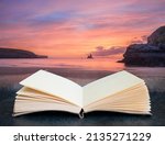 Digital composite image of Stunning sunrise landsdcape of idyllic Broadhaven Bay beach on Pembrokeshire Coast in pages of imaginary open reading book