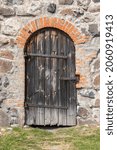 Old Arched Wooden Door In A...