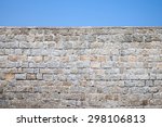 Old Gray Stone Wall And Blue...