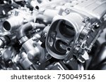 Shiny motor parts, V12 engine, closeup photo with selective focus