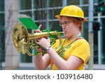 Small photo of SAN FRANCISCO, CA - MARCH 17: A woman playing saxhorn during the St. Patric's Day Parade. March 17, 2012 in San Francisco, CA