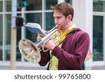 Small photo of SAN FRANCISCO, CA - MARCH 17: A man playing saxhorn during the St. Patric's Day Parade. March 17, 2012 in San Francisco, CA