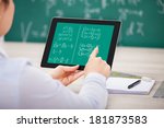 Close-up Of Student Learning Mathematical Equations On Digital Tablet