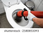 Small photo of Plumber Toilet Blockage Assistance. WC Cleaning And Plumbing