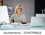 Small photo of Business Invoice Tax Management. Accountant Using Monitor