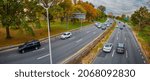 Small photo of Morning car traffic, Bronx and Pelham Pkwy view to Hutchinson River Parkway, very wide angle panorama, New York, Bronx, 10462, United States of America, 11.02.2021