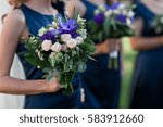   bridesmaids blue wedding bouquets