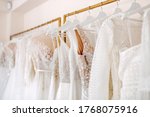 Bridal dresses collection at showroom. Luxury bridal gowns shop.