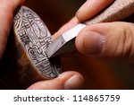 Chinese Craftsman Carving A...