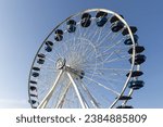 Small photo of Oklahoma City, USA - October 25th, 2023: Sunny view of the Wheeler Ferris Wheel, Wheeler District.