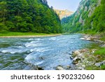 The Dunajec River Gorge. National border between Poland and Slovakia. The Pieniny Mountains Range nature reserve.