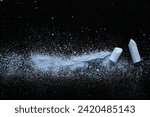 Small photo of Black Background With Light Blue Crushed Chalk. Small Pieces of Blue School Chalk Lying on Spilled Powder. A Line Made of Crushed Pastel Blue Chalk. Flat Lay.