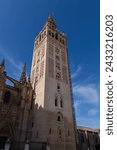 Small photo of La Giralda bell tower of Seville Cathedral in Sevilla, Andalusia, Spain.