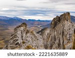 Small photo of Rocky Sapper Hill of Ogilvie Mountains at confluence of Engineer Creek and Ogilvie River near Dempster Highway in breathtaking autumn fall wilderness landscape, Yukon Territory, YT, Canada